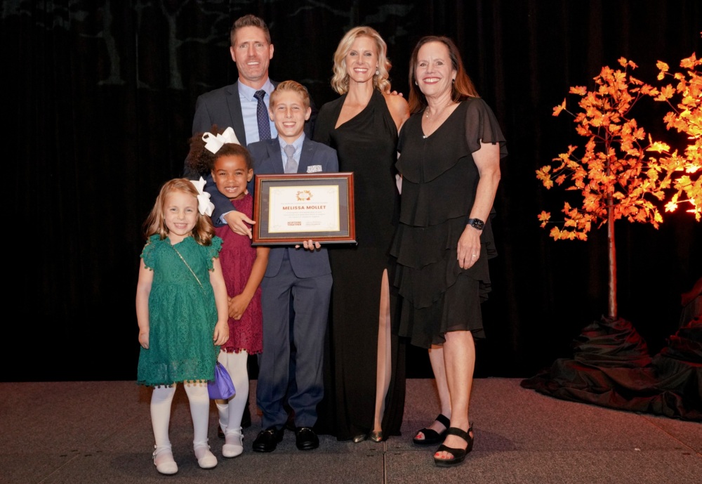 Melissa Mollet and family at Taste in Potomac Gala as Melissa is honored for her advocacy and support of Paths for Families' mission