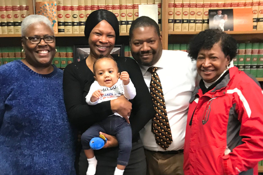 Happy extended family at an adoption finalization